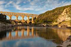 The Pont du Gard is an ancient Roman aqueduct that crosses the Gardon River in southern France